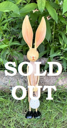 PISTACHIO RABBIT W/FEET HOLDING A EGG